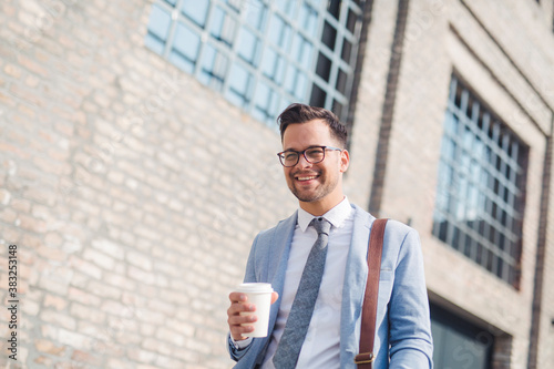 Cheerful businessman going to work