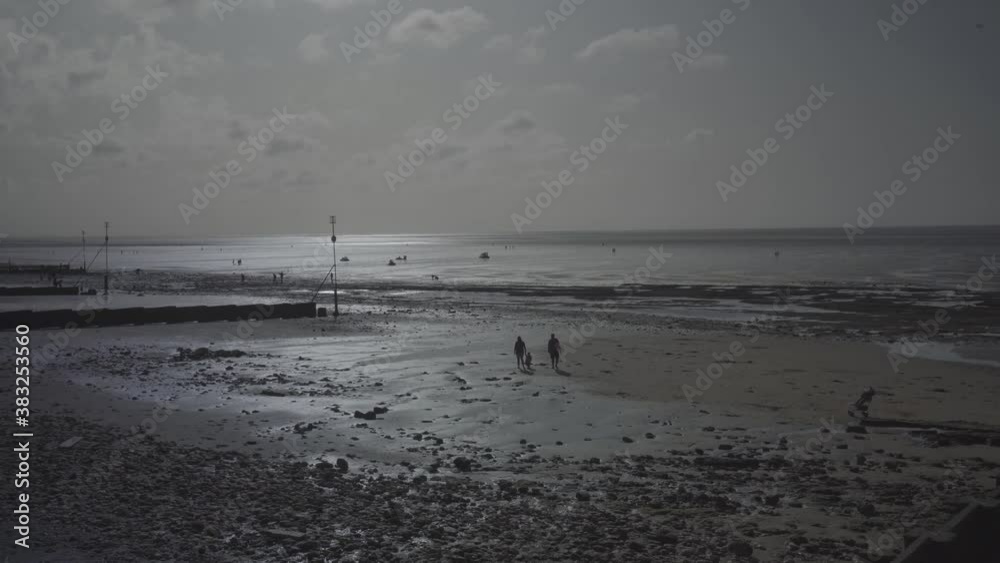 bright light reflected on the low tide water in hunstanton beach england uk during summer day bright light reflected on the low tide water in hunstanton beach england uk during summer day