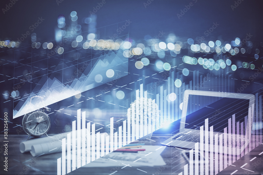 Stock market graph and table with computer background. Double exposure. Concept of financial analysis. Stock market graph and table with computer background. Double exposure. Concept of financial analysis.