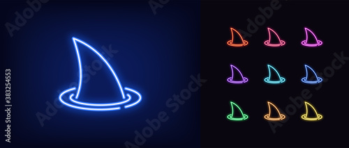 Neon shark fin, glowing icon. Neon silhouette of shark fin
