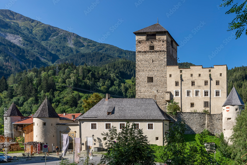 Landeck Castle, the emblem of the city of Landeck, Austria, is located on a steep rock spur in the Upper Inntal valley