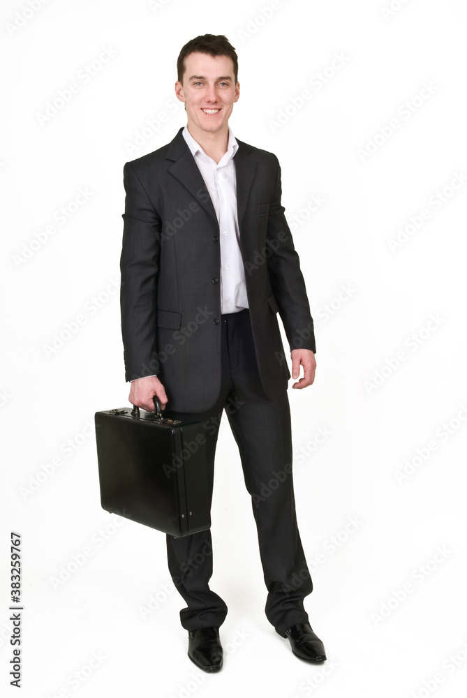 Young man in business suit with case Young man in business suit with case