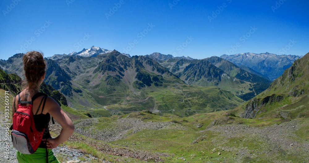 young woman looking Col du tourmalet in the french Pyrenees