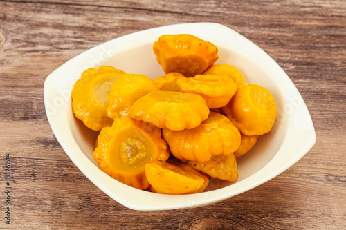 Marinated yellow patisson in the bowl