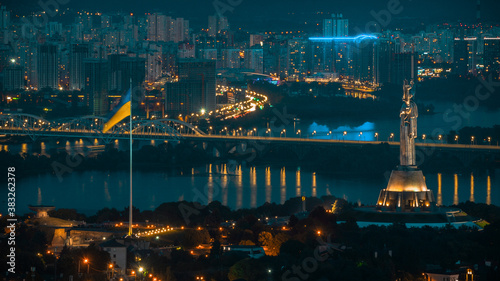 Motherland and the main flagpole of the country, which was installed by Klitschko. View of the left bank of Kiev photo