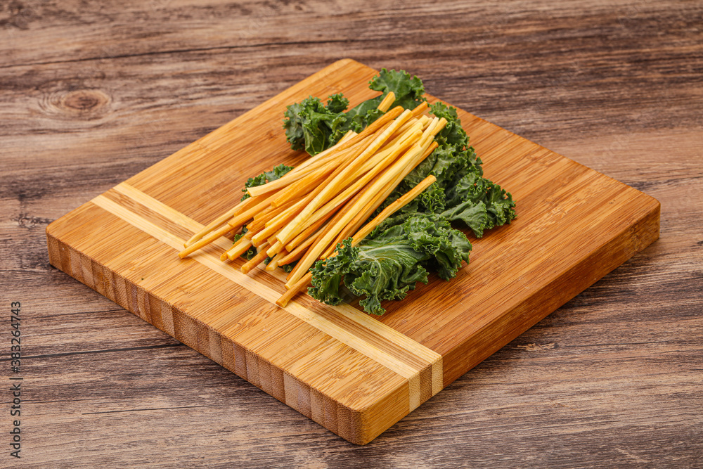 Chechel cheese sticks over board