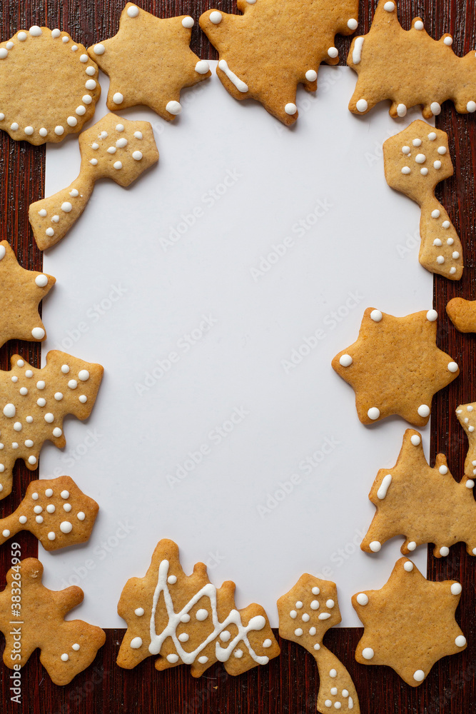 frame for new year xmas greetings, white background with gingrbread cookies frame for new year xmas greetings, white background with gingrbread cookies