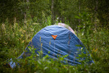 Tourist tent for life in the forest. The scarf is in nature. A place to rest. Waterproof tent.