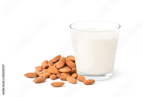 Canvas Glass of almond milk with almond seed isolated on white background
