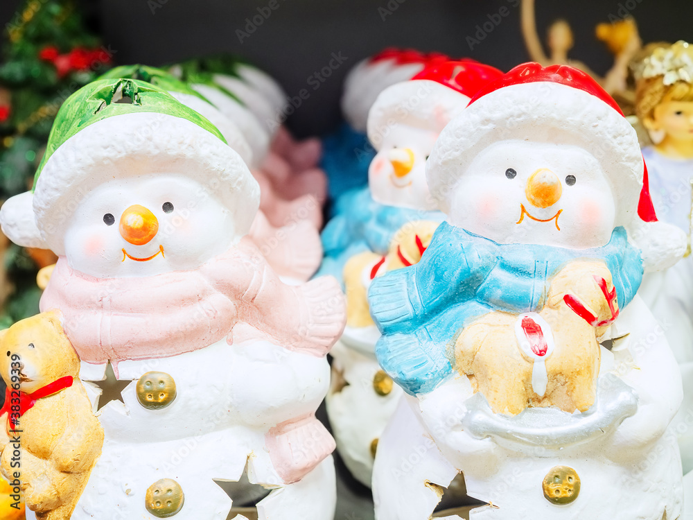 White ceramic decorative snowmen figurines with star-shaped slots. Decorative Christmas Lights White ceramic decorative snowmen figurines with star-shaped slots. Decorative Christmas Lights