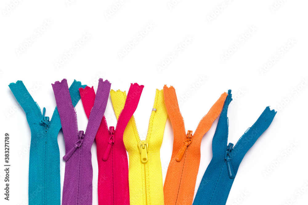 Bright zipper of different colors and variants in the textile industry