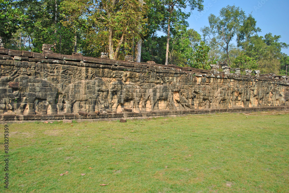 Ancient bas-reliefs at the Terrace of the Elephants in Angkor Thom