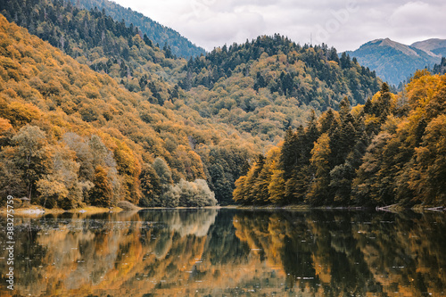 autumn lake scenery. Romantic golden forest with lake view landscape. Montenegro, Beogradsko jezero photo