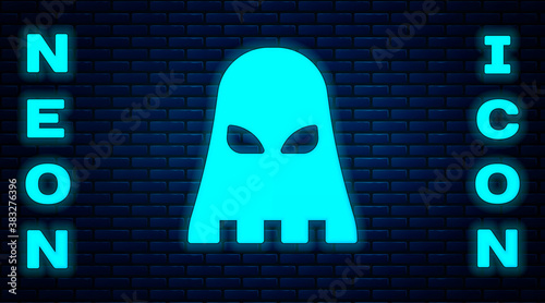Glowing neon Executioner mask icon isolated on brick wall background. Hangman, torturer, executor, tormentor, butcher, headsman icon. Vector.