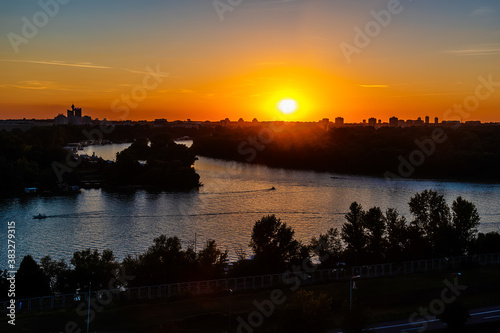 Belgrade, Serbia-August 27, 2020: The place where the Sava River flows into the Danube River (serbian:Ušće). It is located in the center of Belgrade near the Great War Island and the Belgrade Fortress © nedomacki