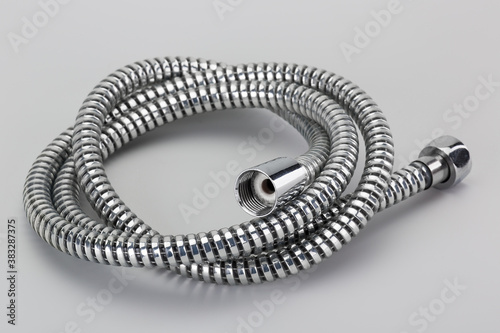 A flexible and convenient shower for a flexible mealic hose