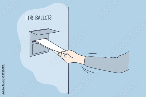Politics, election, america, voting concept. Man voter citizen hand putting absentee sheet of paper with chosen president candidate in mailbox for ballots. United States of America elections 2020.