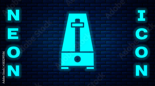 Glowing neon Classic Metronome with pendulum in motion icon isolated on brick wall background. Equipment of music and beat mechanism. Vector.