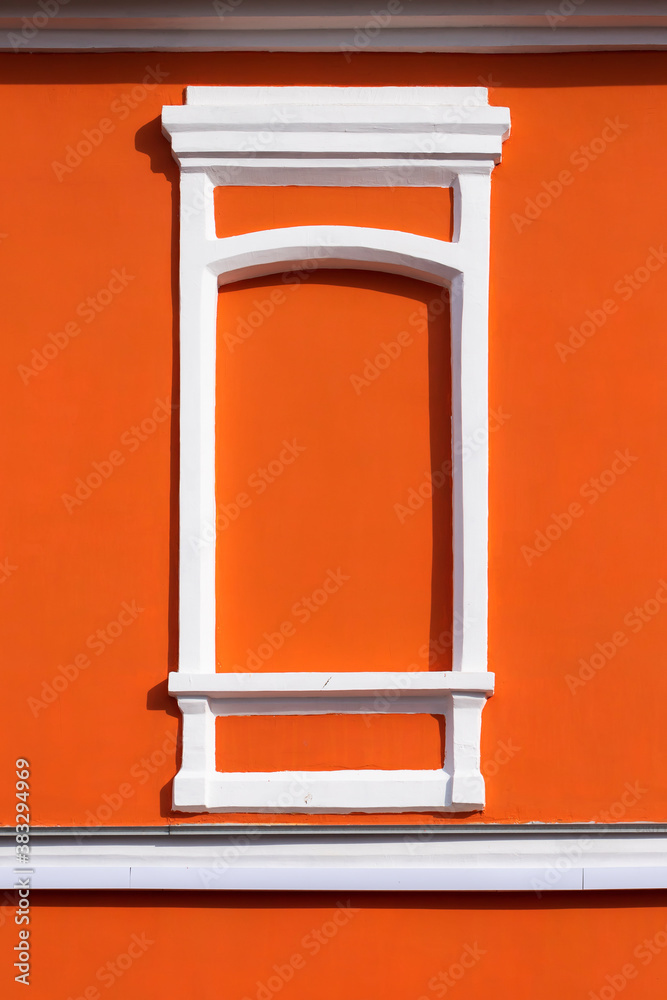Walled window bright red wall white frame front view