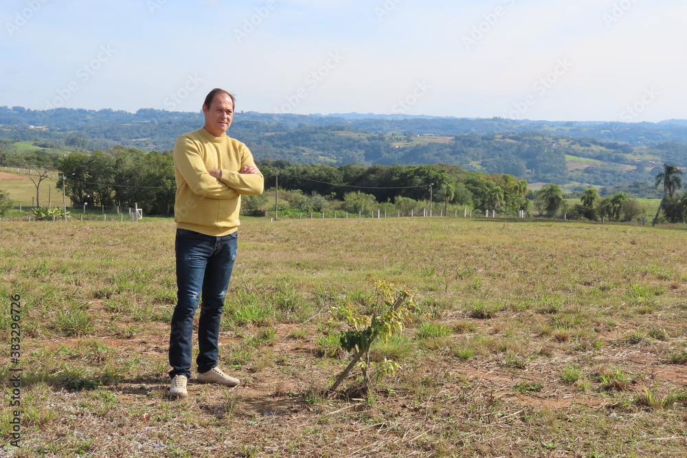 Fototapeta premium person walking in the field