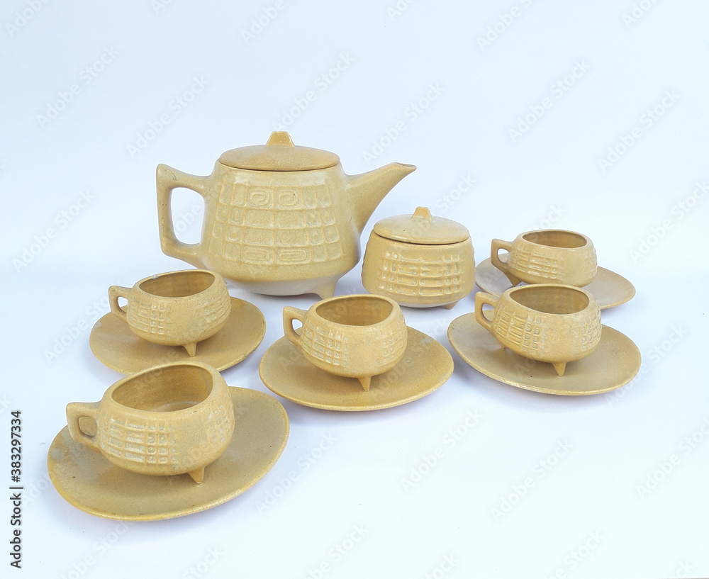 Mid century modern ceramic coffee set - vintage European cups and coffee pot isolated