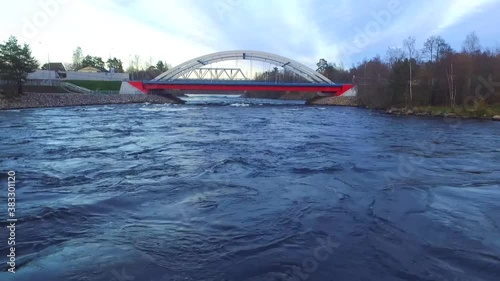 Drone view of the Vuoksi River Bridge and the Vuoksi River flow in autumn day, Losevo, Leningrad Oblast, Russia
 photo