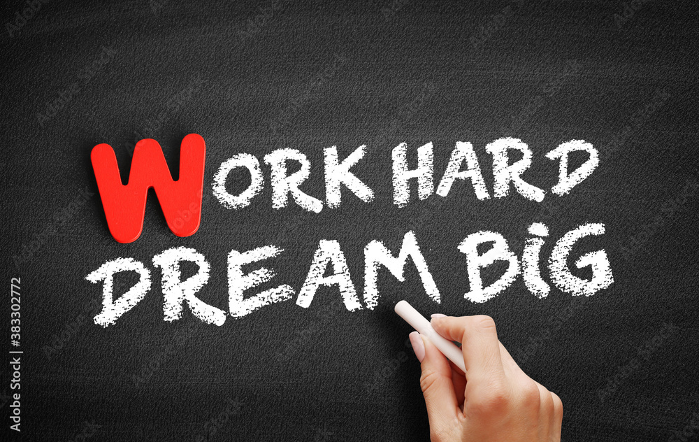 Fototapeta premium Work Hard Dream Big text on blackboard, business concept background