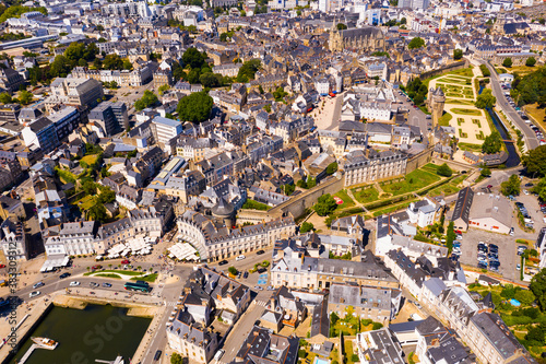 Scenic aerial view of walled Breton town of Vannes overlooking ramparts gardens on sunny summer day, Morbihan, France..