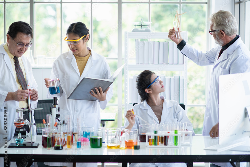 team of scientists student working in laboratory. team of scientists student working in laboratory.