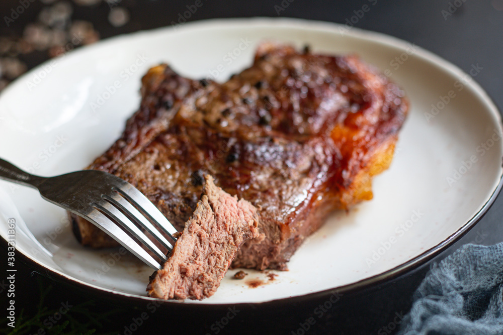 beef steak ribeye bbq grilled veal meat fried rare or medium tasty top view copy space for text food background rustic beef steak ribeye bbq grilled veal meat fried rare or medium tasty top view copy space for text food background rustic
