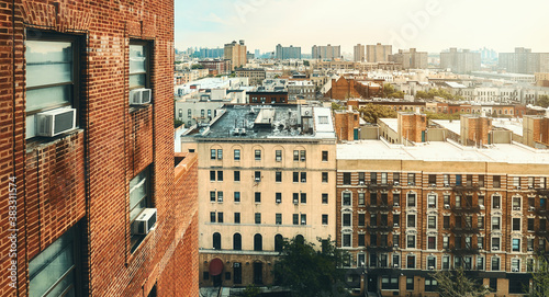 Photos Harlem neighborhood cityscape at sunset, color toning applied, New York City, USA