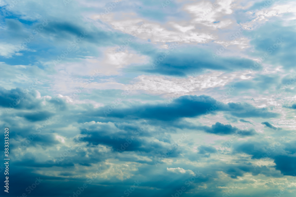 Blue dramatic sky with volume clouds and sun rays Blue dramatic sky with volume clouds and sun rays