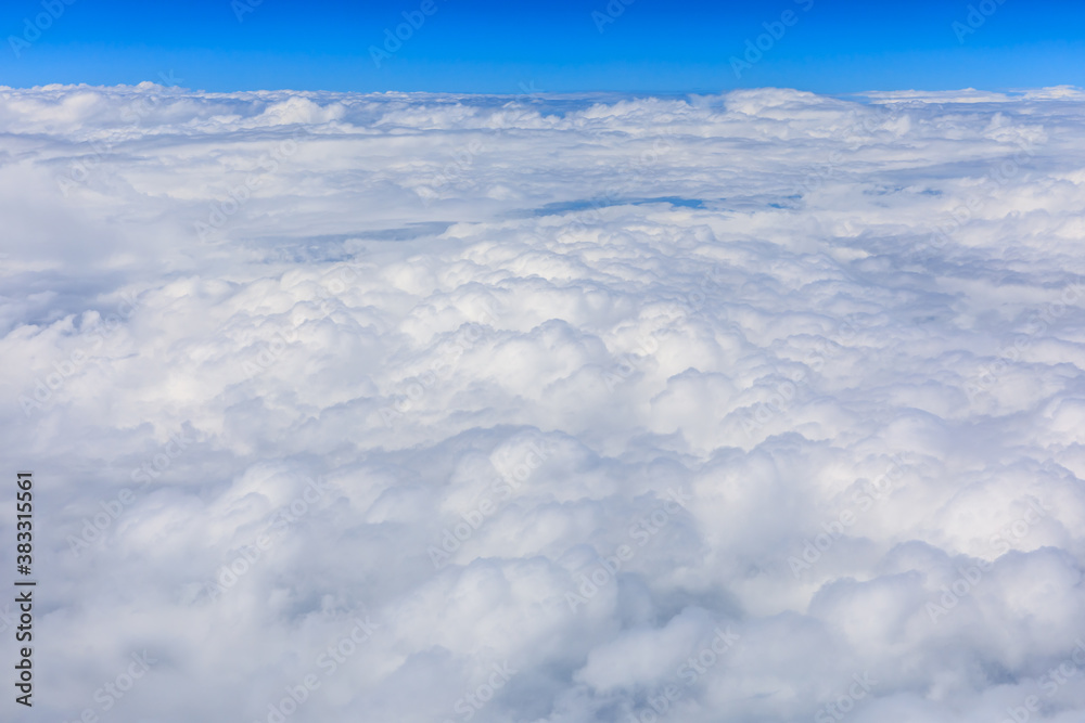 Sky cloudscape.Blue sky and white clouds on a sunny day.Aerial view. Sky cloudscape.Blue sky and white clouds on a sunny day.Aerial view.