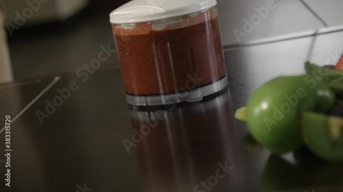 Mixer with fruits at work