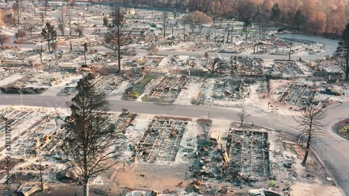 Aerial view of a burned down community and vehicles from the 2020 Almeda forest fire in Southern Oregon, USA photo