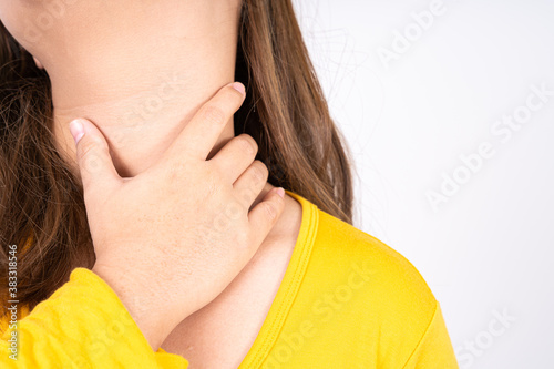 Female hand touching thyroid nodule. Medical, healthcare for advertising concept.