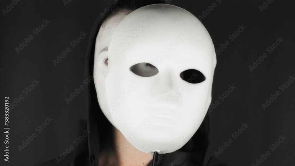 Portrait of a mime and bodypainting woman in white with black lips. Mime woman on black background. Portrait of a mime and bodypainting woman in white with black lips. Mime woman on black background.