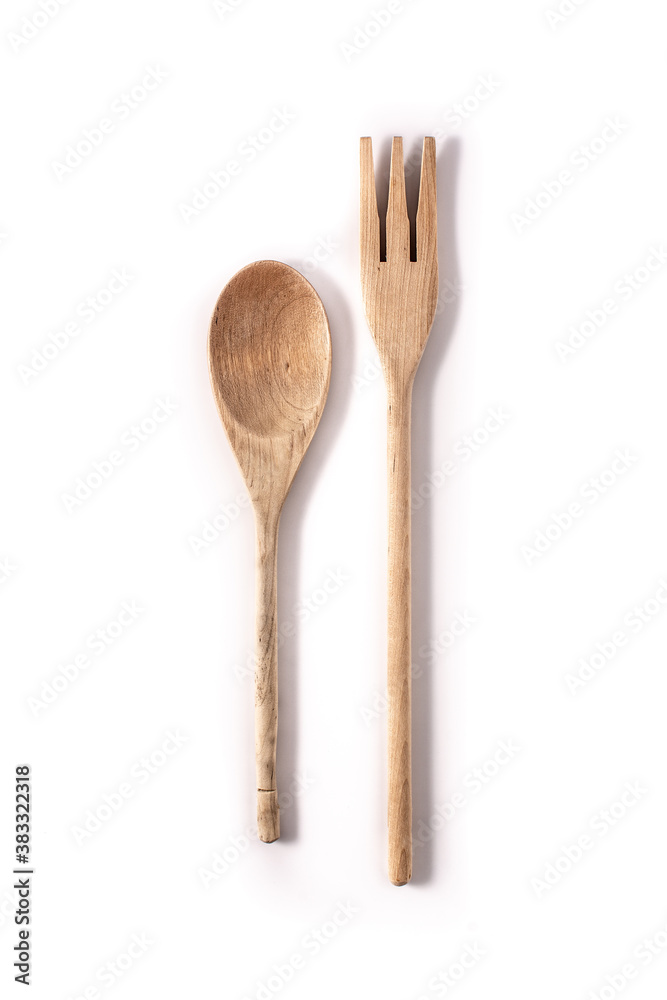 Wooden spoon and fork isolated on white background Wooden spoon and fork isolated on white background