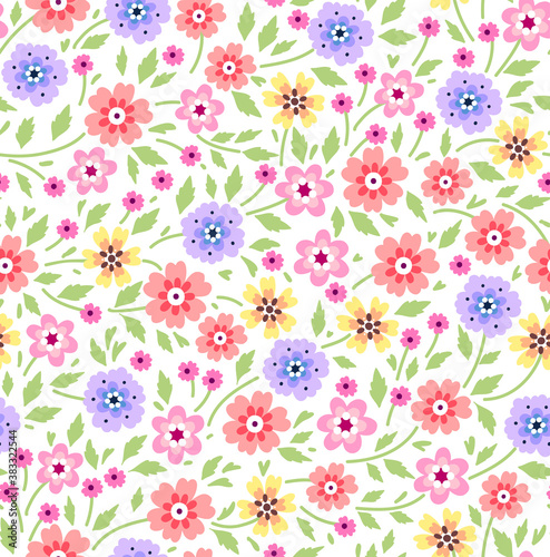 Trendy seamless vector floral pattern. Endless print made of small colorful flowers. Summer and spring motifs. White background. Vector illustration.