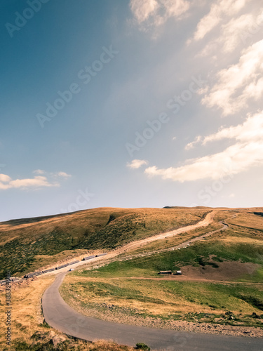 Alpine landscape in the Vulcan Pass, Jiu Valley, Romania, Europe. Road on top of the mountains. Alpine scenery. Autumn sunset.