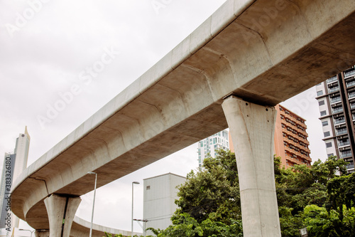 Up view and close up shot of concrete road bridge in the urban area of the city shows texture of grunge and stain for main transportation which performs high strength with the support of the beams