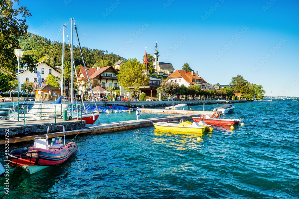 View to the Attersee promenade and city with ships in foreground, Salzkammergut, Austria