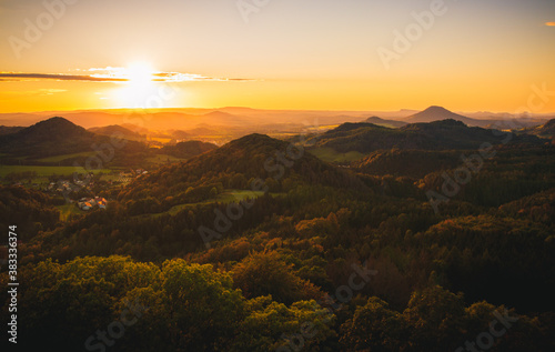Fototapeta Naklejka Na Ścianę i Meble -  sunset on the Střední vrch (Mittenberg) Middlemountain in Czech Republic