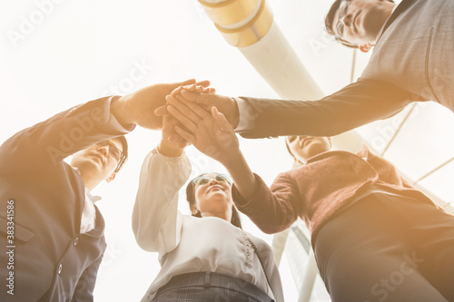 Close up Business people shaking hands, putting their hands together, finishing up meeting. Deal Successful