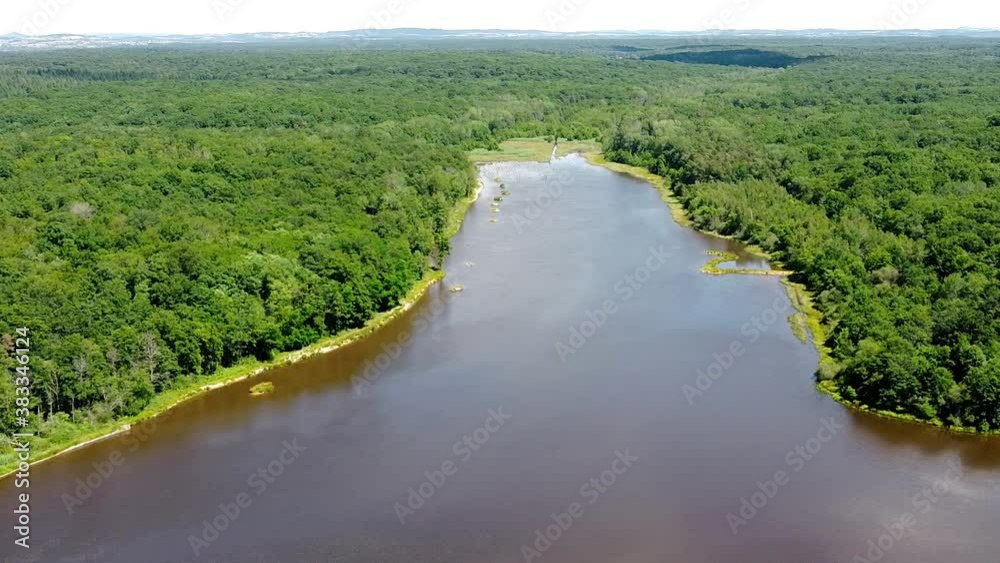 Beautiful landscape from the above shot with a drone of forest and lake or river in France Beautiful landscape from the above shot with a drone of forest and lake or river in France