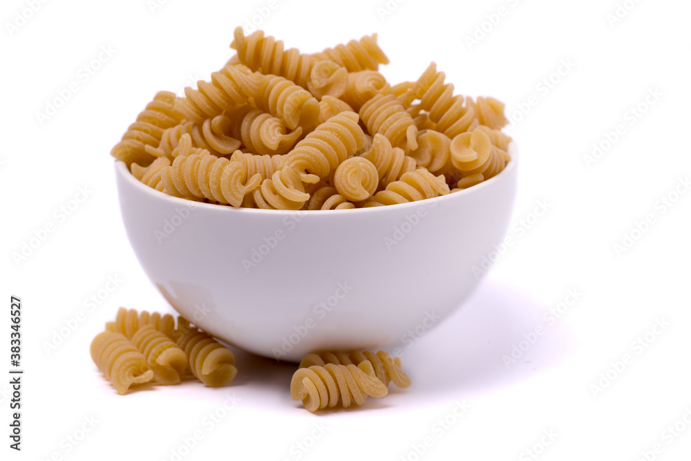 bowl filled with rigatoni isolated on a white background bowl filled with rigatoni isolated on a white background