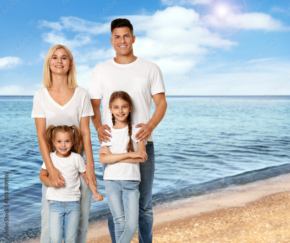 Happy family near sea on sunny day. Summer vacation Happy family near sea on sunny day. Summer vacation