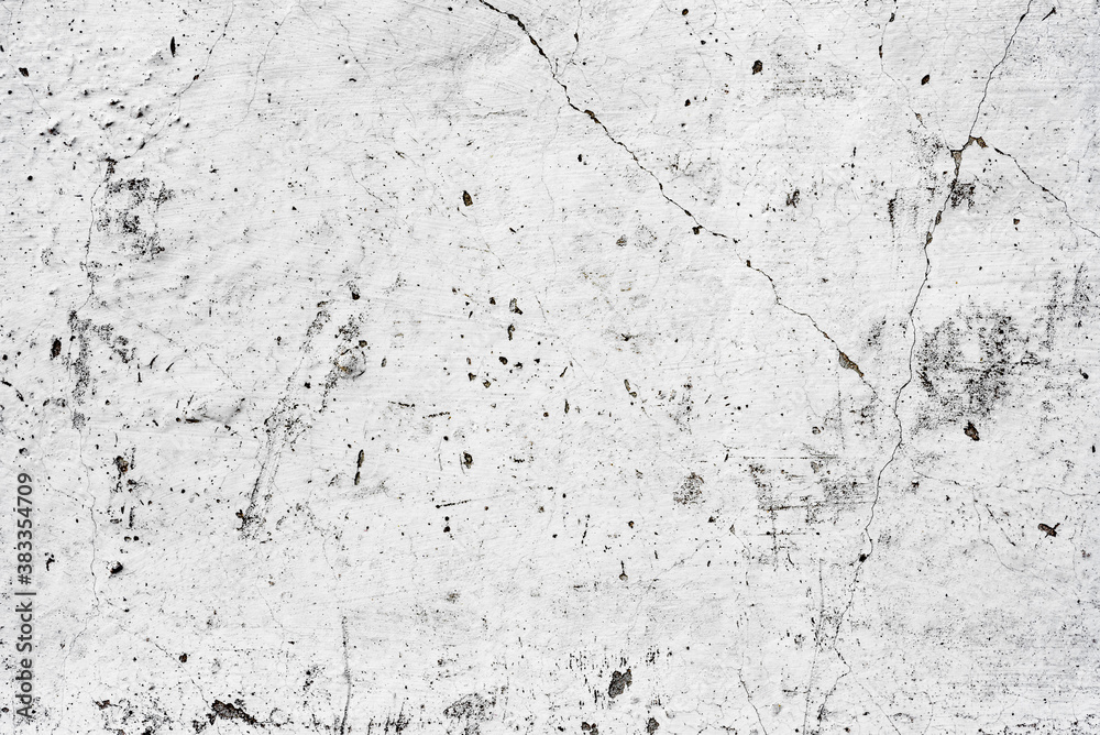 Obraz premium Texture of a concrete wall with cracks and scratches which can be used as a background