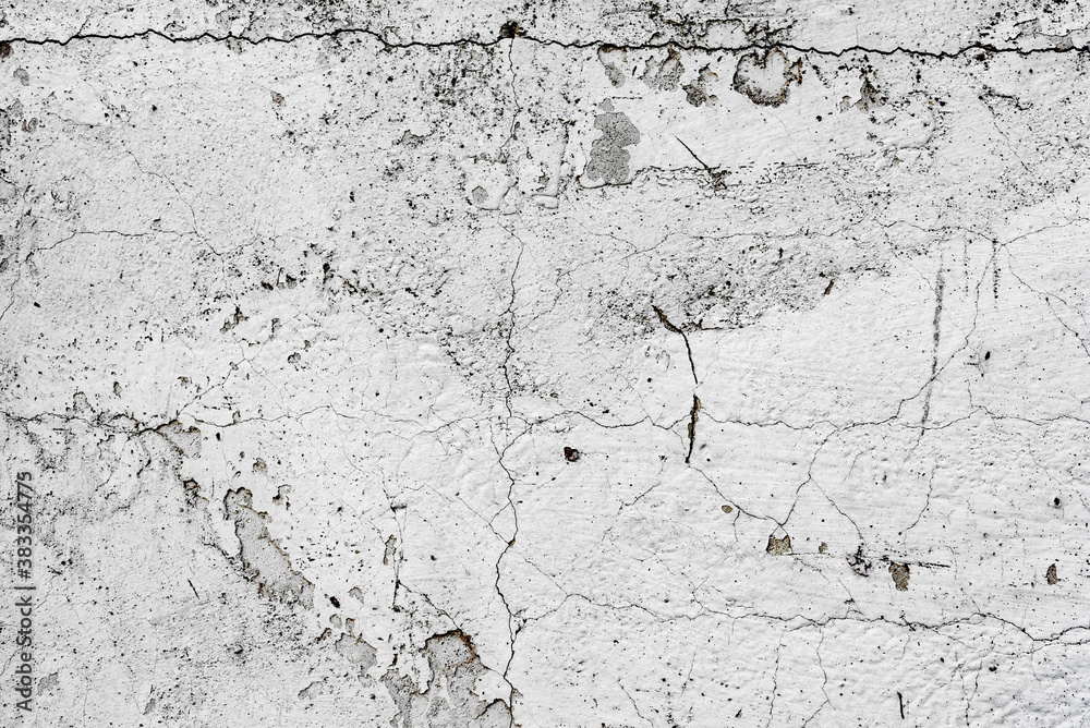 Obraz premium Texture of a concrete wall with cracks and scratches which can be used as a background
