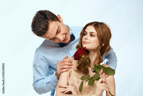 married couple man and woman romance red rose isolated background holiday flowers